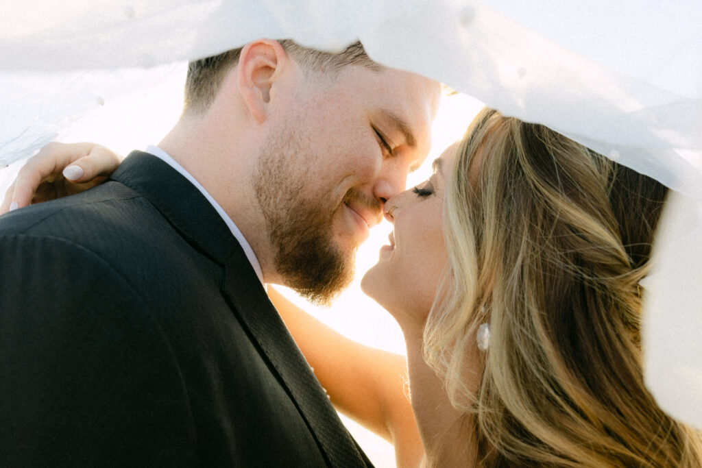Romantic sunset wedding portraits at Schnepf Farms Big Red Barn in Arizona