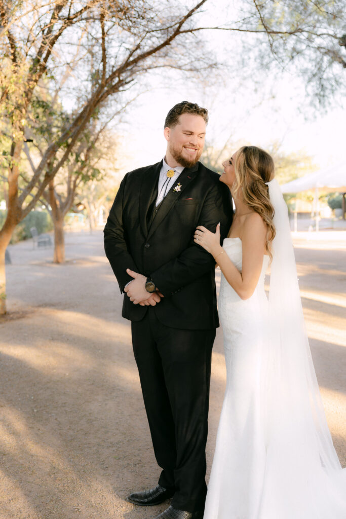 Romantic sunset wedding portraits at Schnepf Farms Big Red Barn in Arizona