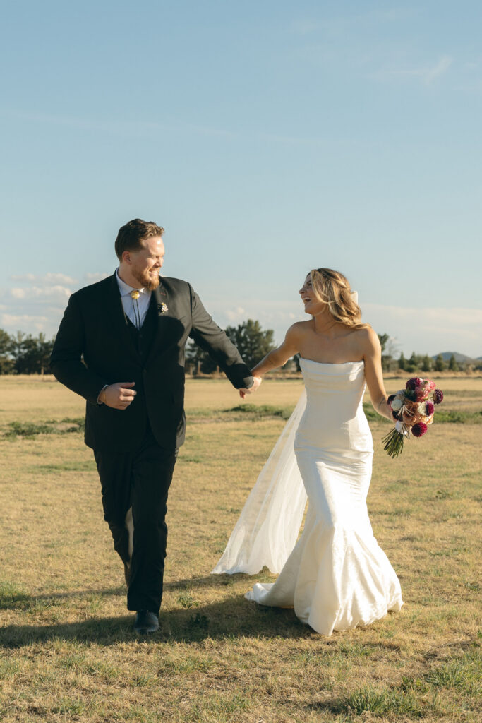 Romantic sunset wedding portraits at Schnepf Farms Big Red Barn in Arizona