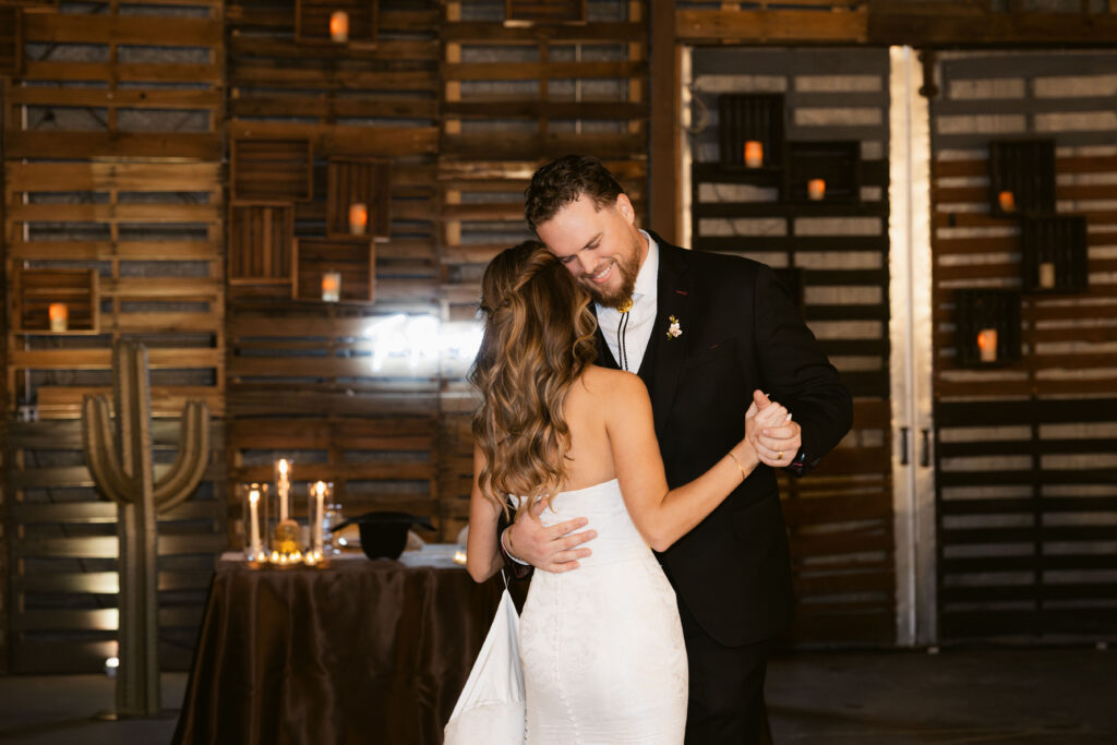 Bride and groom first dance at Big Red Barn wedding reception at Schnepf Farm