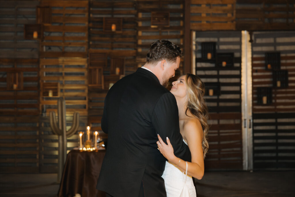 Bride and groom first dance at Big Red Barn wedding reception at Schnepf Farm