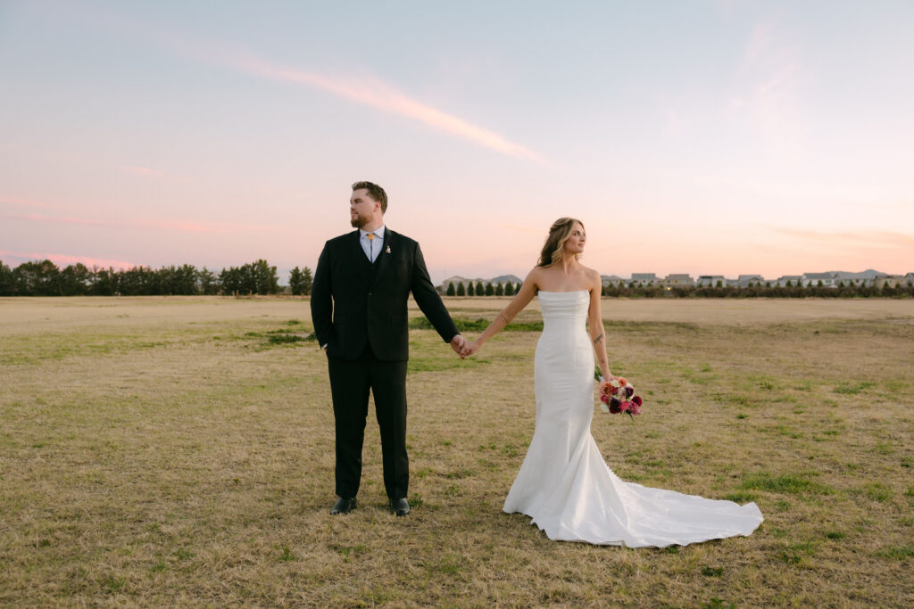 Romantic sunset wedding portraits at Schnepf Farms Big Red Barn in Arizona
