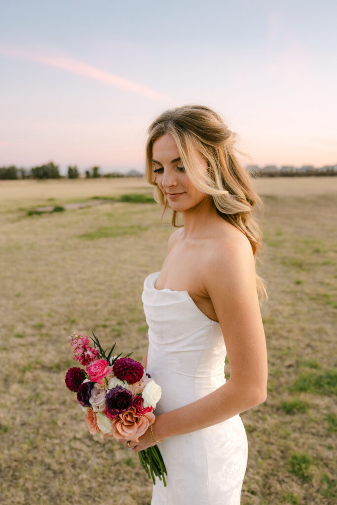 Stunning Arizona sunset wedding portraits at Schnepf Farms Big Red Barn in Arizona