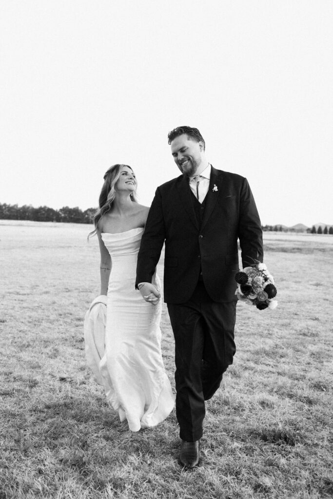 Romantic sunset wedding portraits at Schnepf Farms Big Red Barn in Arizona
