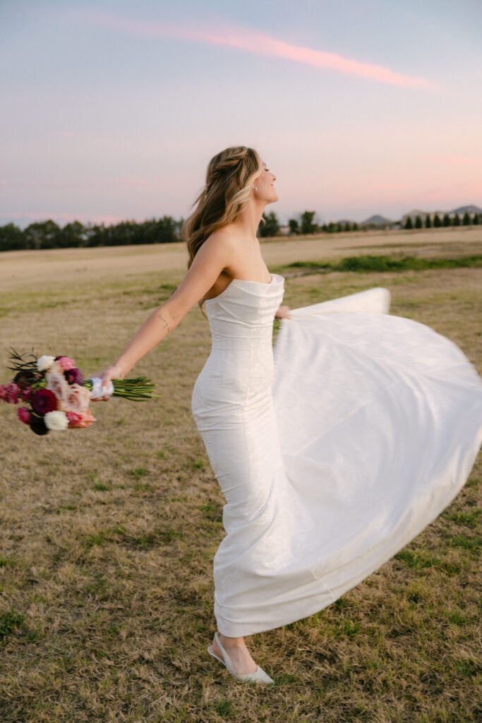 Bride sunset wedding portraits at Schnepf Farms Big Red Barn in Arizona