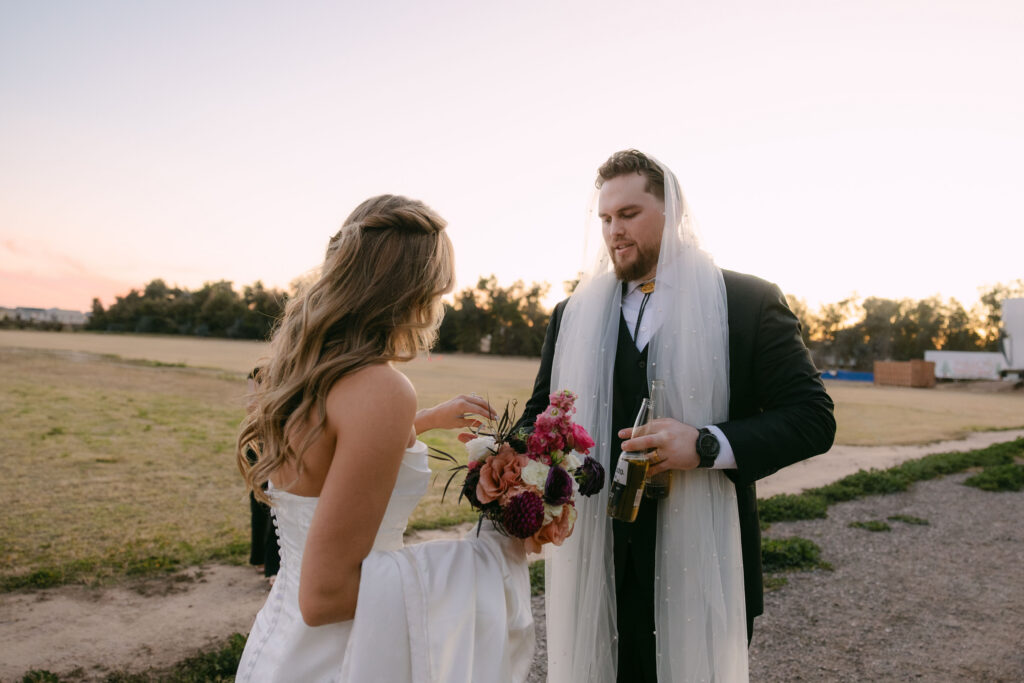 Sweet sunset wedding portraits at Schnepf Farms Big Red Barn in Arizona