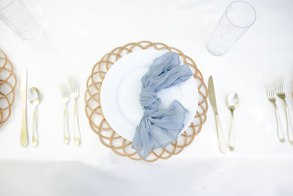 backyard wedding garden tablescape decor with blue details.